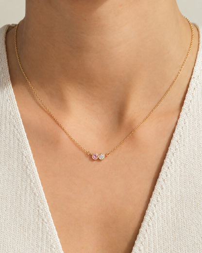 Two-stone personalized birthstone necklace on model